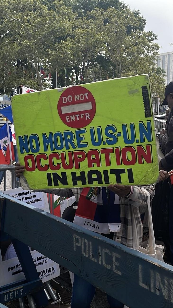 Sign reading Do Not Enter, No More U.S.-U.N. Occupation in Haiti